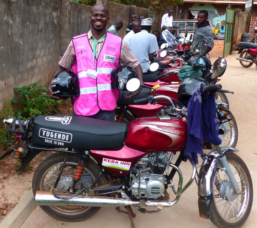 Line of motobikes with men Tugende